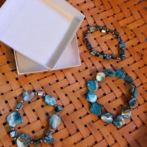 Three blue shell bead bracelets